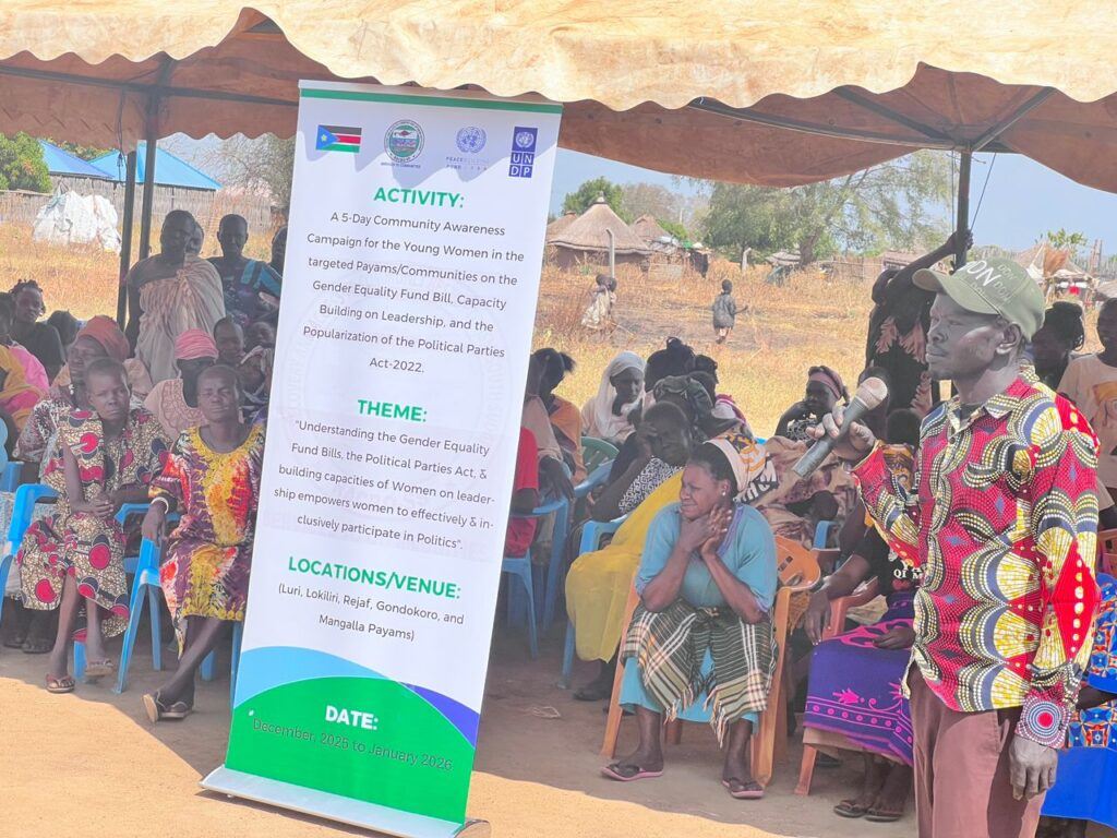  Community participants behind the activity/program banner.